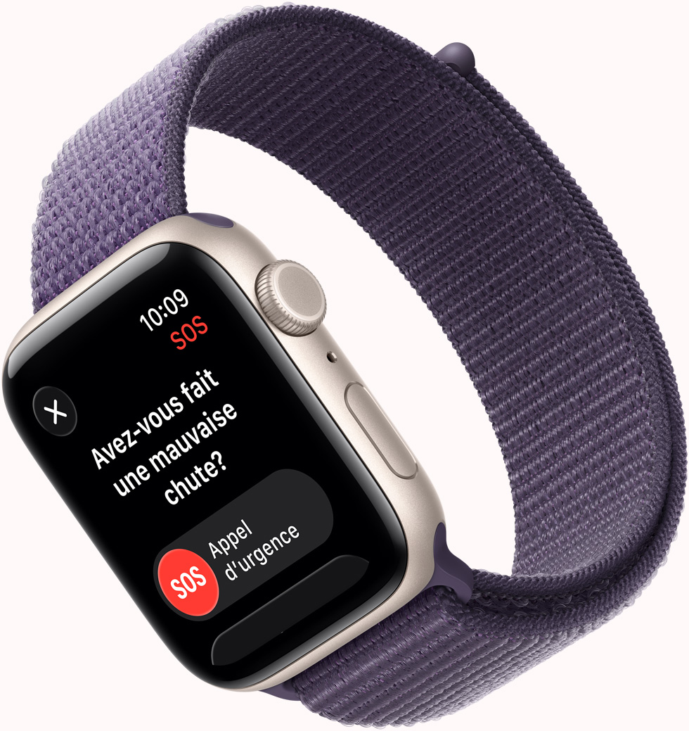 Apple Watch SE 3, boîtier en aluminium, comète, notification SOS de détection de chute, bouton d’appel d’urgence, côté droit, couronne Digital Crown, microphone, bouton latéral, bracelet sport à rabat, brume violette