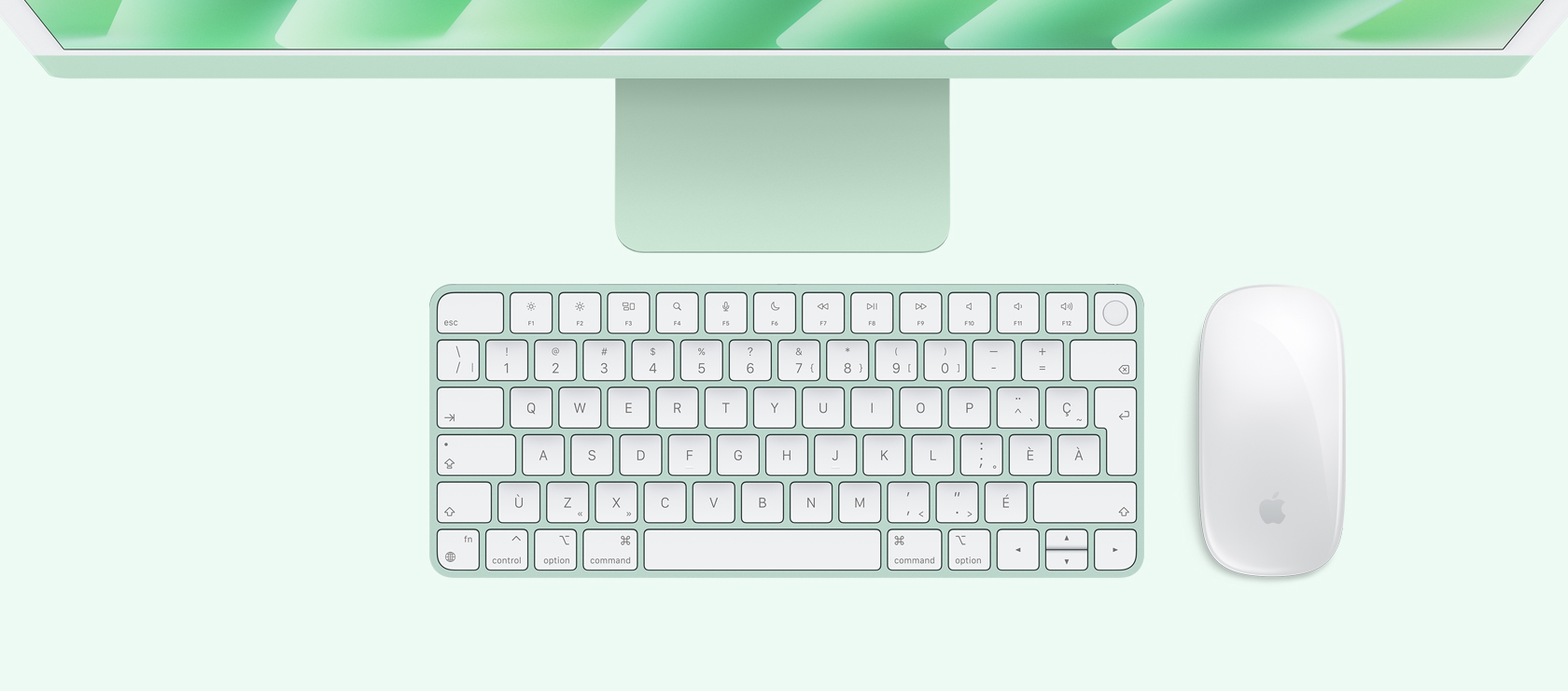 iMac vert vu de haut, avec souris et clavier assortis.