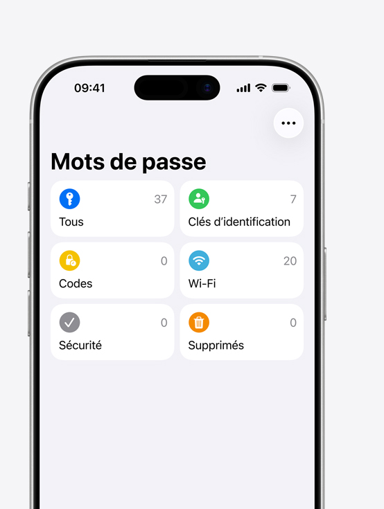 Écran d’iPhone montrant le menu de l’app Mots de passe et les options Tous, Clés d’identification, Codes, Wi-Fi, Sécurité et Supprimés