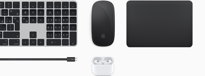 مجموعة اكسسوارات تشمل لوحة مفاتيح ماجيك، وماجيك ماوس، ولوحة تعقب ماجيك، وكابل ثندربولت 4 برو، وAirPods Pro .