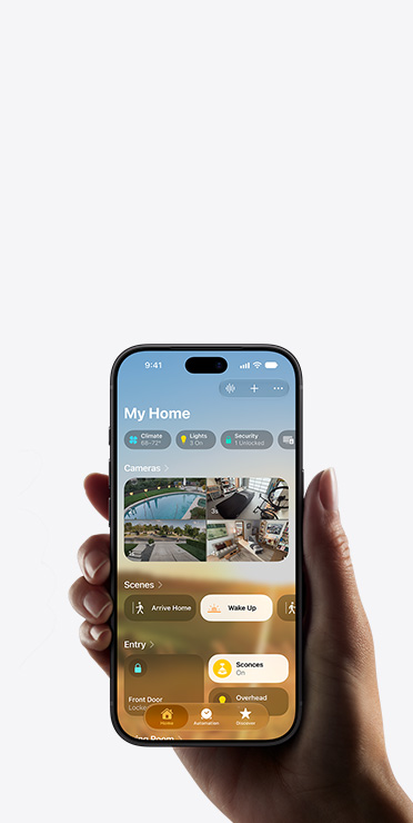 A hand holding an iPhone showing the Home app with a smart home accessory setup prompt