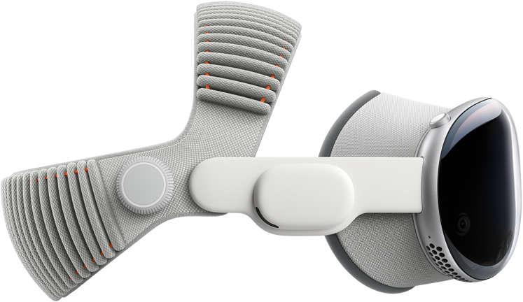 صورة جانبية لجهاز Apple&nbsp;Vision&nbsp;Pro متصل بكل من حاجب الضوء والحزام المغزول القابل للتعديل.