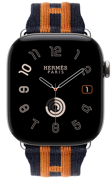 Apple Watch Hermès Series 12, Radial analogue watch face, (hour, minute and second hands, complications: date, Activity rings), titanium case, silver colour, right side exterior, Digital Crown, raised side button, paired with Rocabar Club band, Bleu Nuit/Orange colour, dark blue knit material with orange raised striped design that incorporates the Hermès H