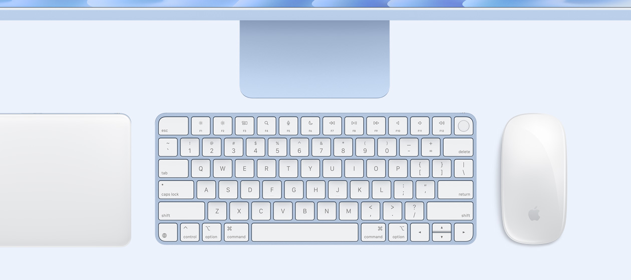 Overhead view of iMac with Magic Trackpad, keyboard and mouse