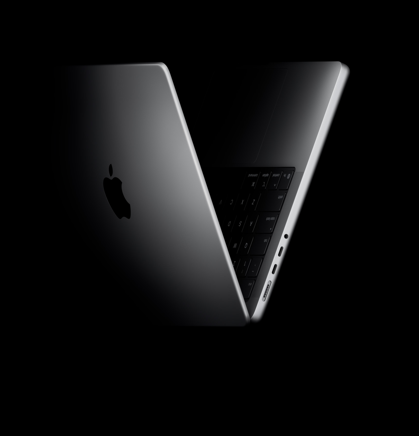MacBook Pro posicionada en forma de V, en alusión al chip M5