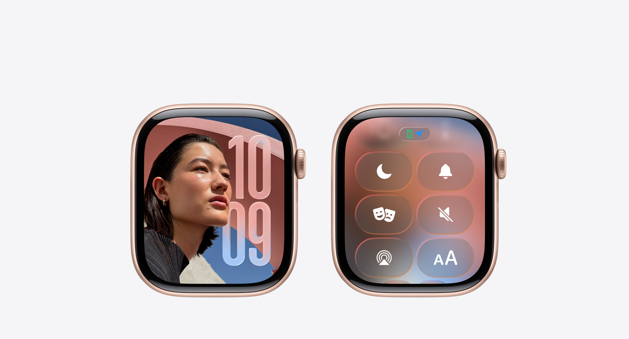 Eine Apple Watch in Roségold ohne Armband, die Uhr App auf dem Zifferblatt zeigt das neue Liquid Glass Design in watchOS 26